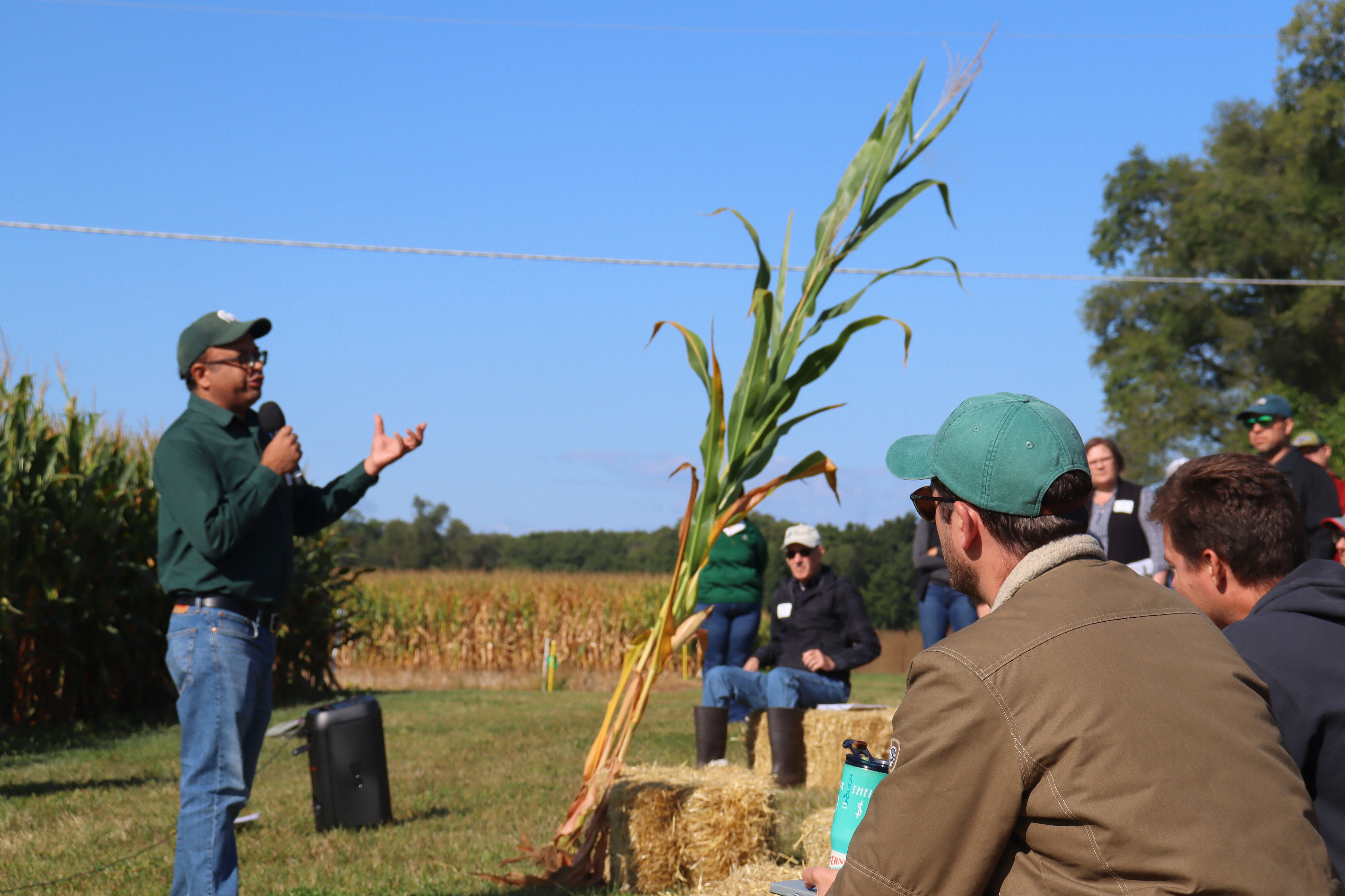 A man speaks about corn-growing methods to a crowd at Kellogg Biological Station_s LTAR site in Hickory Corners. - Edited.jpg